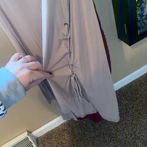 Tan high low tank top with lace up detail